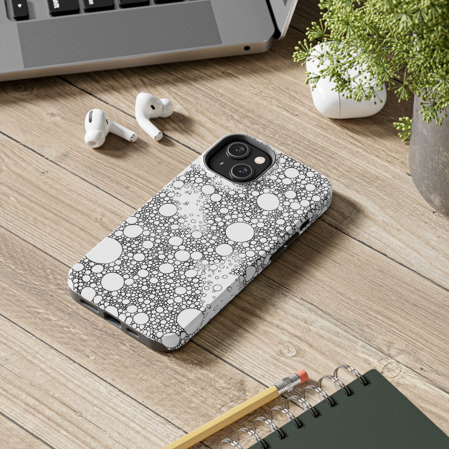 Funda resistente y elegante con diseño de burbujas: protección duradera para tu dispositivo.