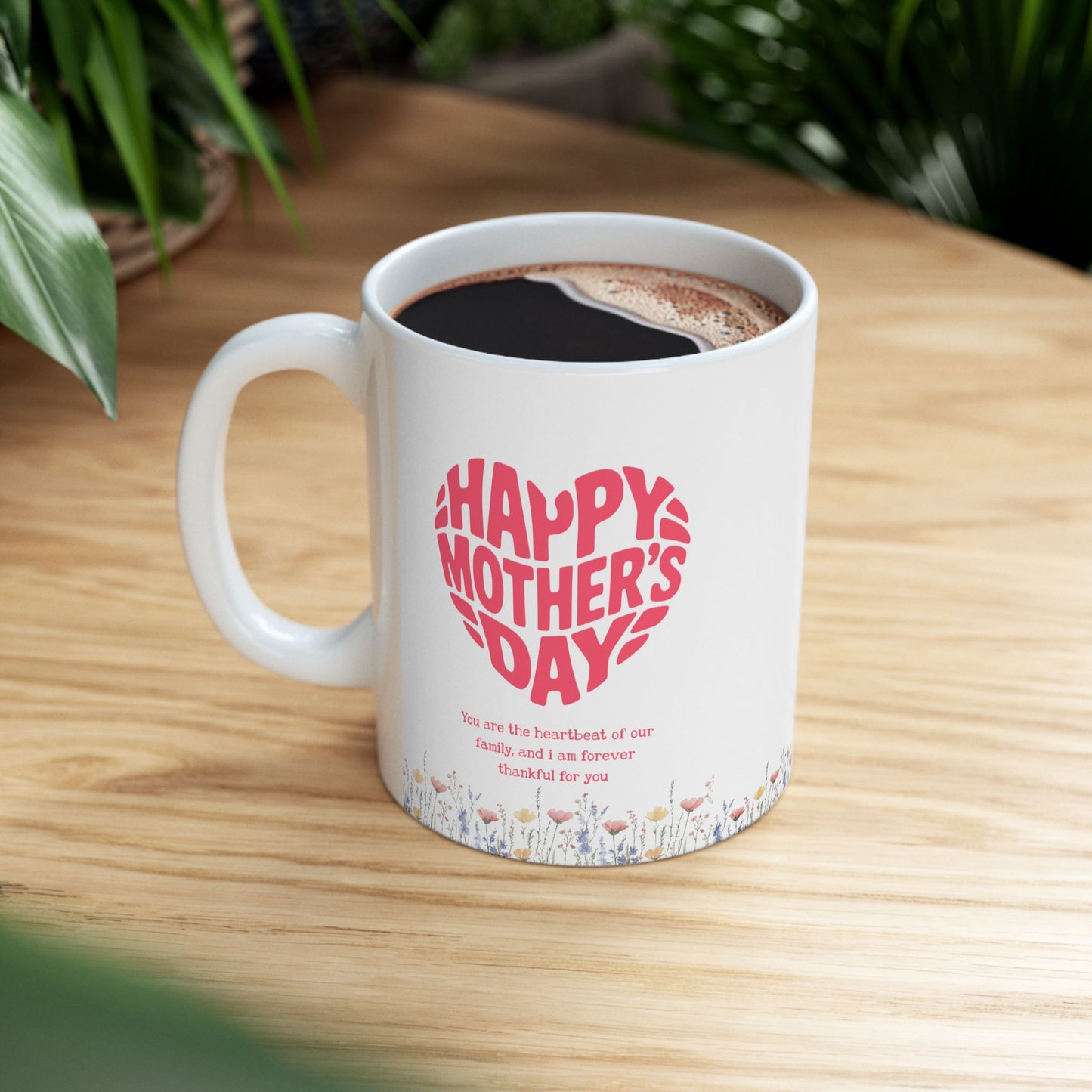 Taza de cerámica floral con texto "Feliz Día de la Madre"